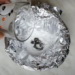 Cleaning a silver chain using foil, baking soda, salt and soap