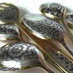 Silver tablespoons with flowers