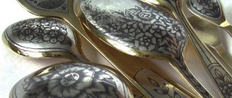 Silver tablespoons with flowers